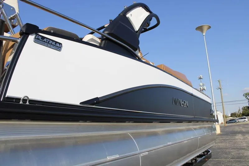 Slide: The Image of 2026 Avalon Catalina Quad Lounger 27 FT pontoon boat, Platinum Edition, side view. - 5