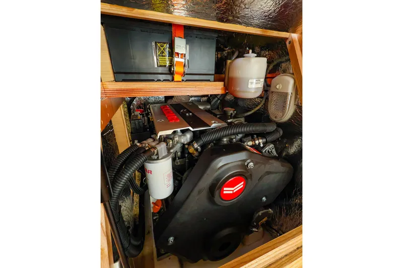 Slide: The Image of Luxurious interior of 2022 Hanse 388 yacht with blue seating and modern amenities. - 12