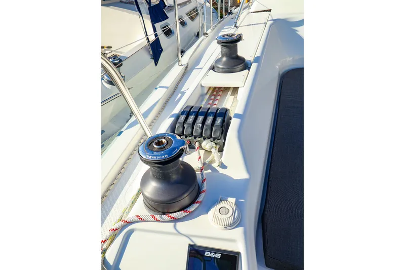 Slide: The Image of Deck view of 2022 Hanse 388 sailboat featuring winches and rigging equipment. - 22