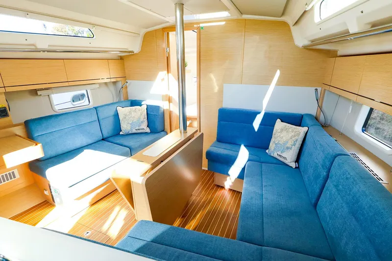 Slide: The Image of 2022 Hanse 388 sailboat deck with modern rigging and sleek design. - 3