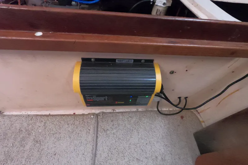 Slide: The Image of Battery charger installed on a 1978 Catalina 30 sailboat interior. - 28