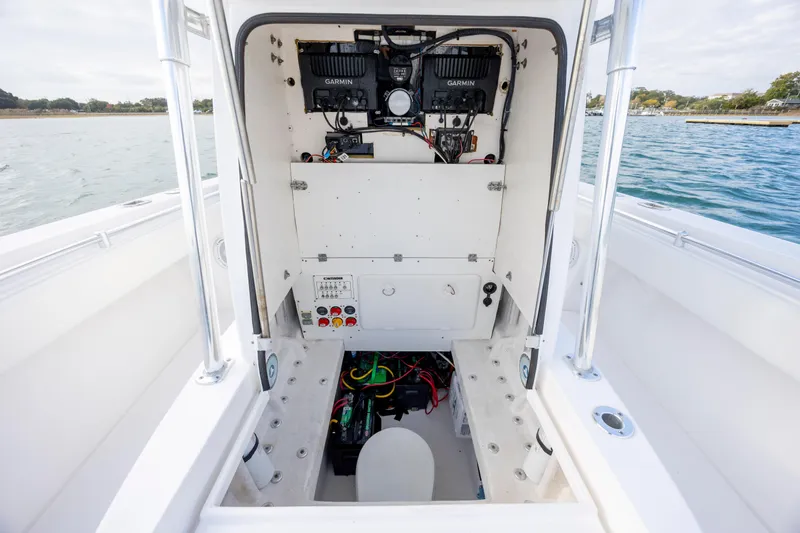 Slide: The Image of 2013 Contender 32 Tournament boat console with Garmin electronics and wiring. - 17