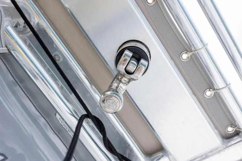 Slide: The Image of Close-up of a 2013 Contender 32 Tournament boat's metal fitting and rope detail. - 26