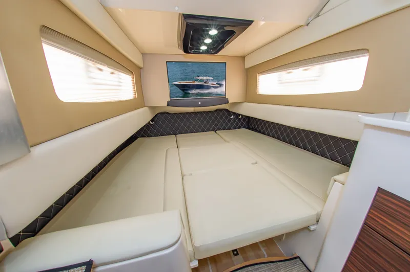 Slide: The Image of Interior of the Scout 42LXF with beige upholstery and a picture on the wall. - 31