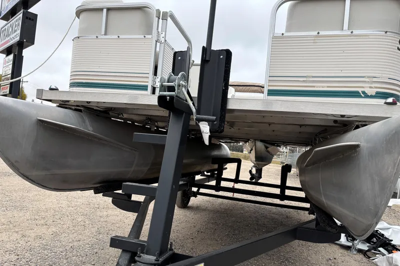 Slide: The Image of 2003 Smoker Craft Oasis pontoon boat on trailer, viewed from below. - 5