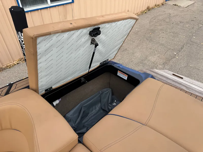 Slide: The Image of Storage compartment in 2021 MasterCraft XT23 boat. - 2