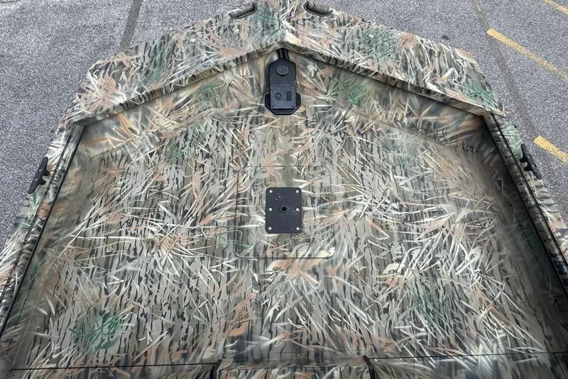 Slide: The Image of Camouflage-patterned 2026 SeaArk 1872 MVJT boat deck, ideal for outdoor adventures. - 3