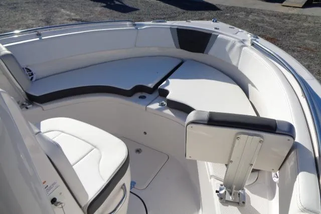 Slide: The Image of 2026 Robalo R222 Center Console boat interior with cushioned seating and sleek design. - 14