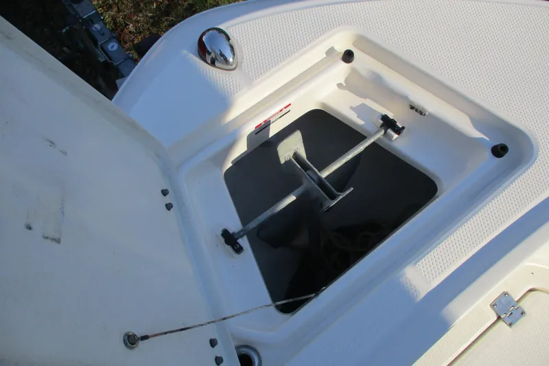 Slide: The Image of Anchor compartment of 2026 Robalo R222 Center Console boat. - 22