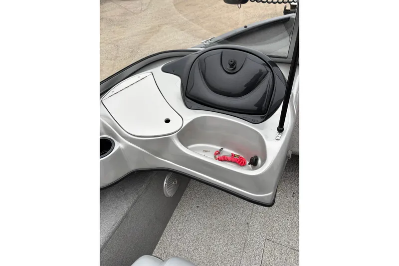 Slide: The Image of 2013 Tracker Pro Guide V-175 Combo boat dashboard with storage compartments. - 15