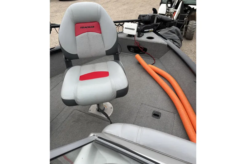 Slide: The Image of 2013 Tracker Pro Guide V-175 Combo boat interior with seat and equipment. - 16