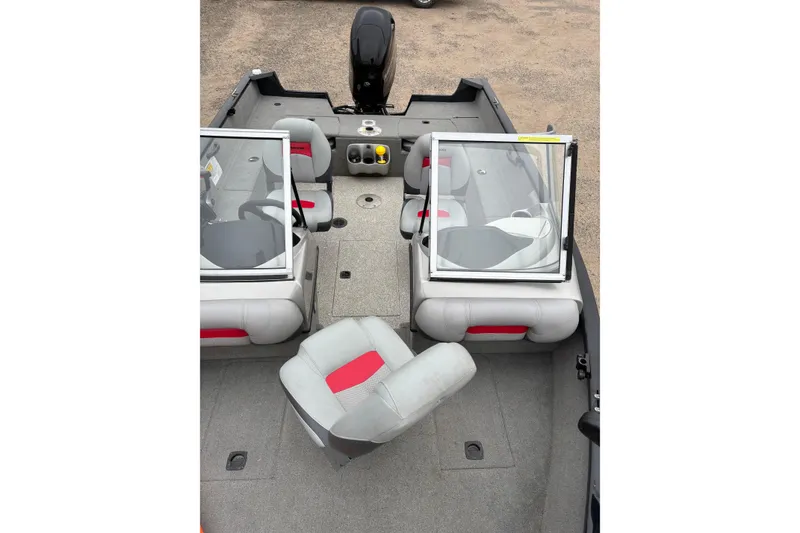 Slide: The Image of 2013 Tracker Pro Guide V-175 Combo boat interior with seating and windshield. - 17