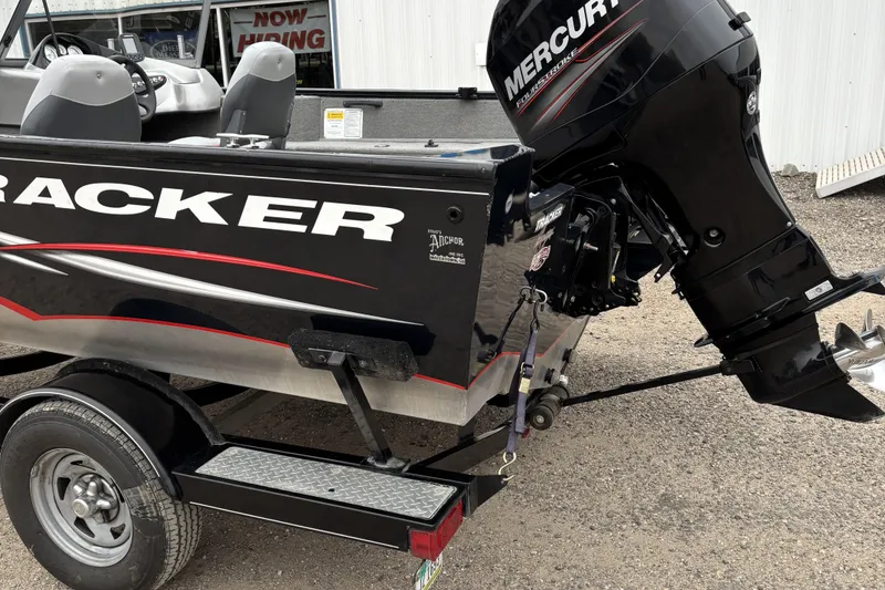 Slide: The Image of 2013 Tracker Pro Guide V-175 Combo boat with Mercury outboard motor on trailer. - 4