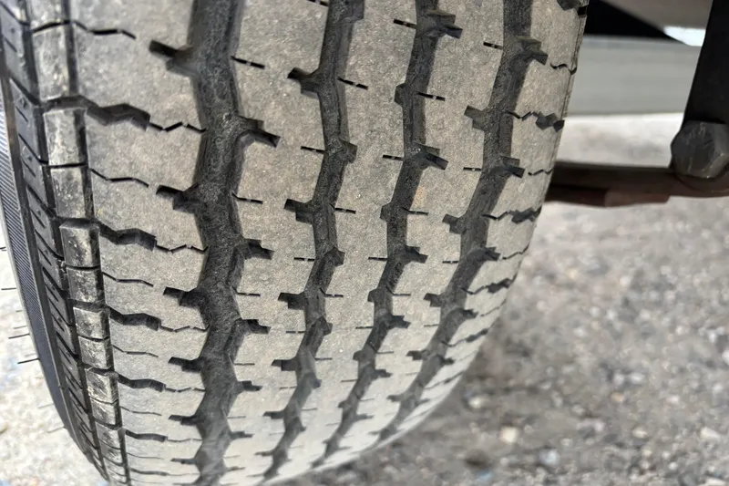 Slide: The Image of Close-up of a tire tread on a 2013 Tracker Pro Guide V-175 Combo. - 6