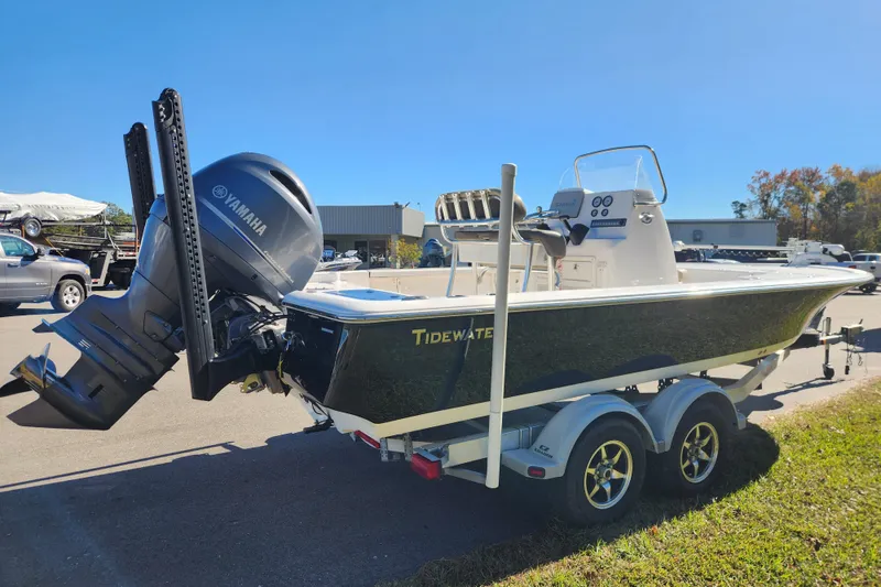 Slide: The Image of 2021 Tidewater 2110 Bay Max boat on trailer with Yamaha outboard motor. - 4