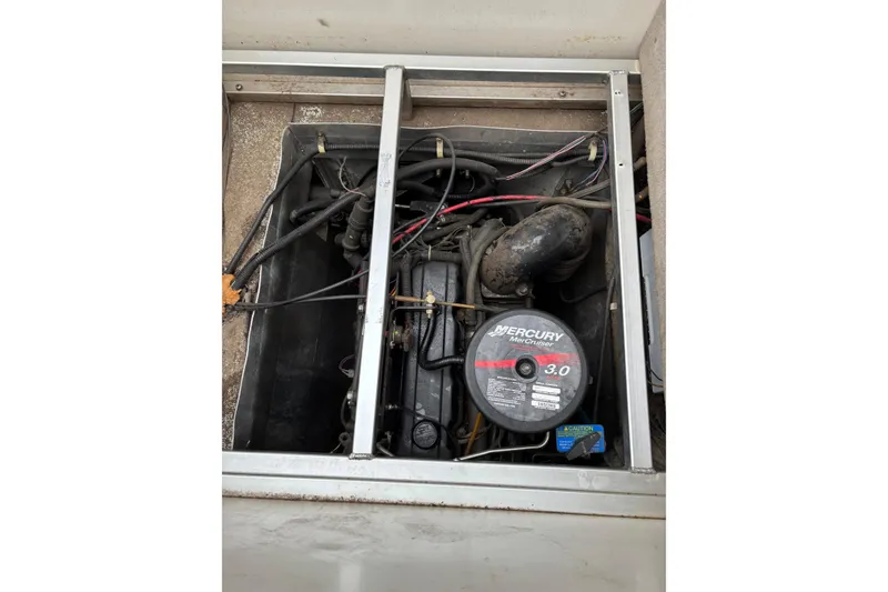 Slide: The Image of Engine compartment of a 2004 Sun Tracker Party Barge 25 I/O Regency Edition. - 13