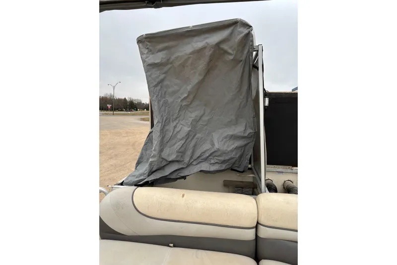 Slide: The Image of 2004 Sun Tracker Party Barge 25 I/O Regency Edition with covered seating area. - 15