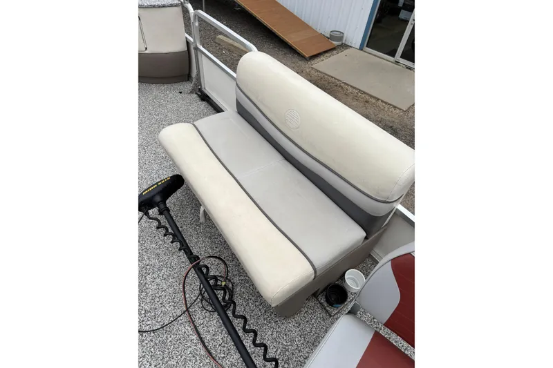 Slide: The Image of 2004 Sun Tracker Party Barge 25 I/O Regency Edition boat seat, beige and gray upholstery. - 21