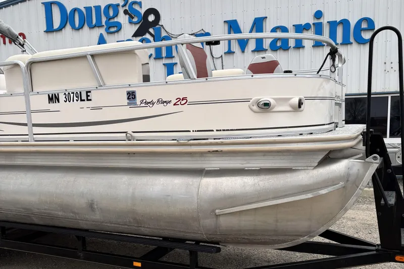 Slide: The Image of 2004 Sun Tracker Party Barge 25 I/O Regency Edition pontoon boat on trailer. - 3
