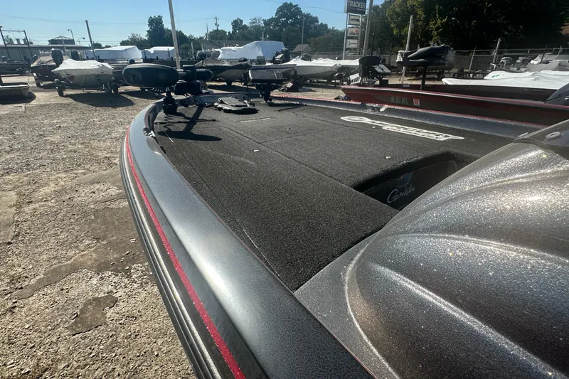 Slide: The Image of 2006 Nitro 482 DC boat with fishing deck, parked outdoors in a lot. - 10