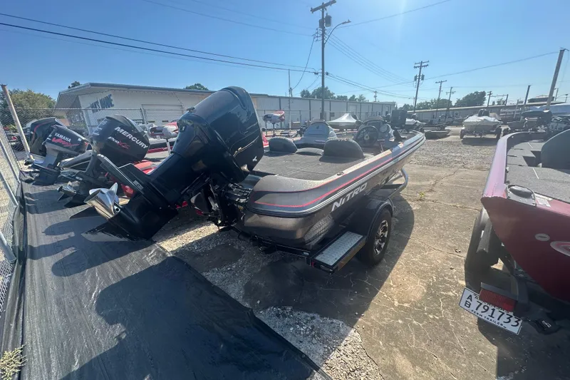 Slide: The Image of 2006 Nitro 482 DC boat with Mercury engine in a boatyard. - 5