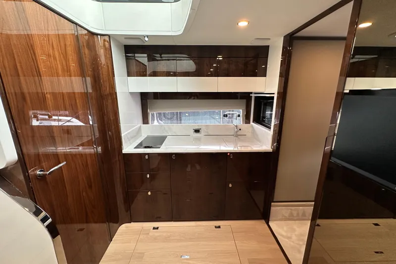 Slide: The Image of Luxurious kitchen interior of 2026 Fairline Targa 45 GT yacht with modern amenities. - 15