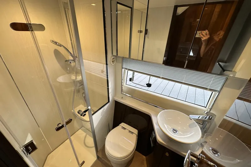Slide: The Image of Luxurious bathroom in 2026 Fairline Targa 45 GT yacht with modern fixtures and shower. - 17