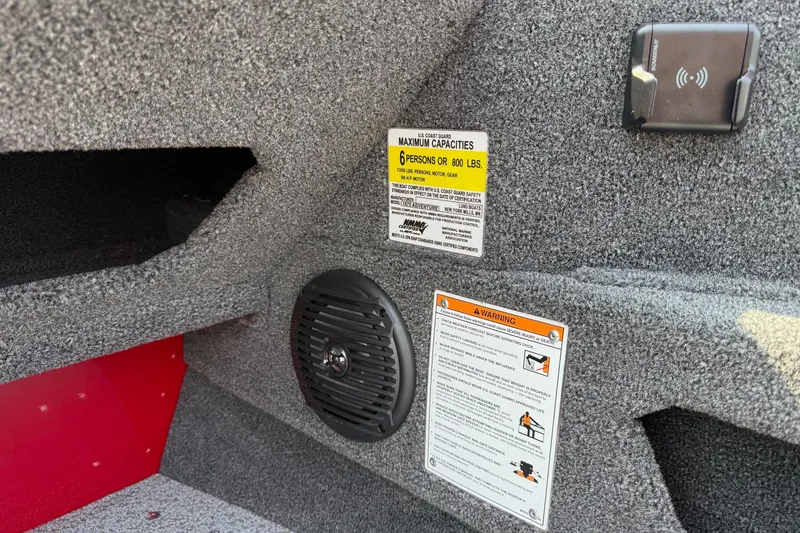 Slide: The Image of 2025 Lund 1675 Adventure Sport interior with capacity and safety labels. - 13