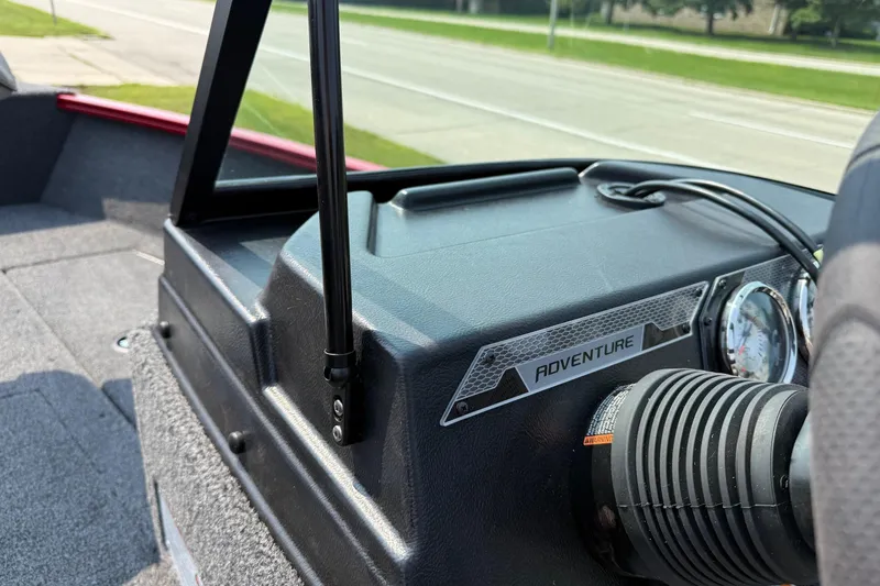 Slide: The Image of 2025 Lund 1675 Adventure Sport dashboard with gauges and Adventure label. - 17