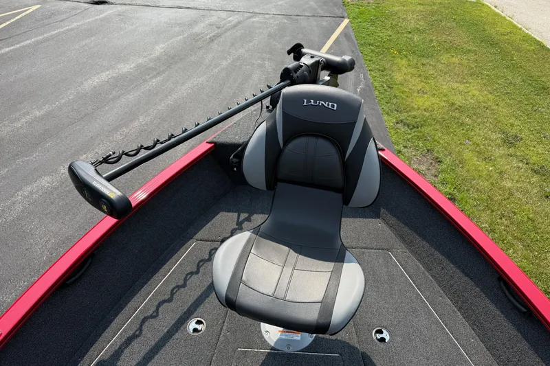 Slide: The Image of 2025 Lund 1675 Adventure Sport boat seat with trolling motor on deck. - 20
