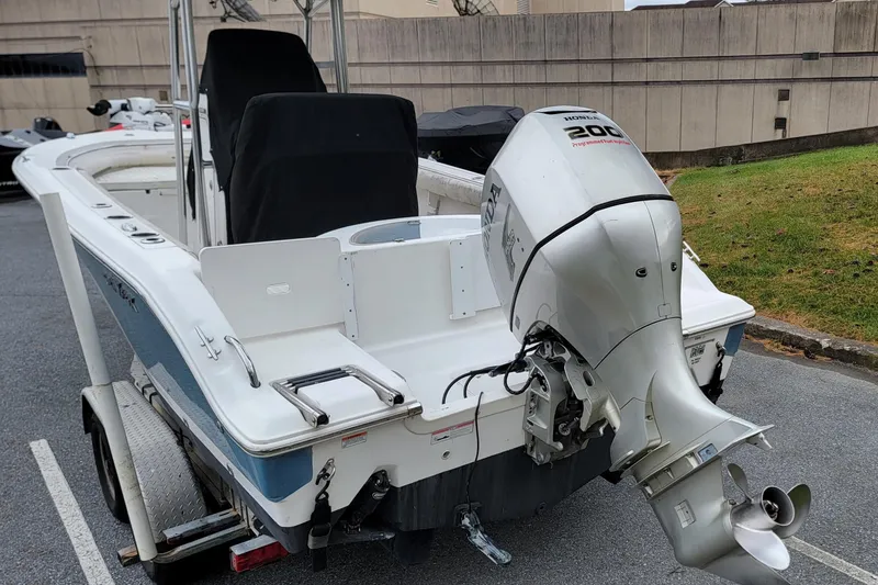 Slide: The Image of 2010 Sea Fox 216 Center Console boat with outboard motor on trailer. - 5