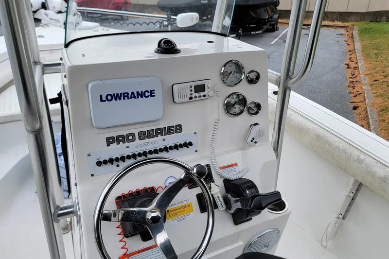 Slide: The Image of Control panel of a 2010 Sea Fox 216 Center Console boat with Lowrance electronics. - 9