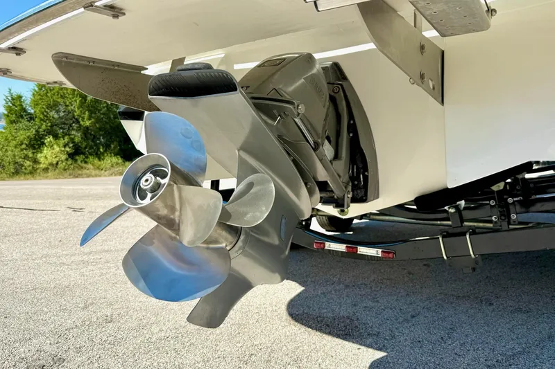 Slide: The Image of Close-up of 2010 Cobalt 232 boat propeller and stern drive on trailer. - 14