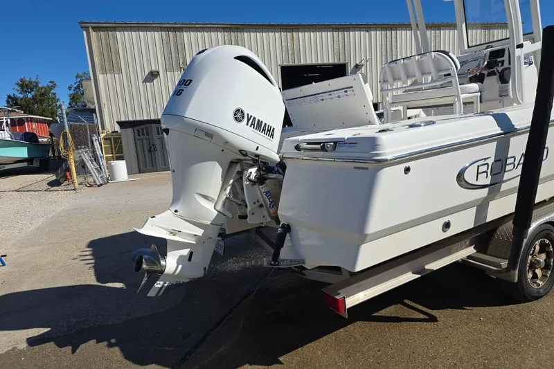 Slide: The Image of 2019 Robalo 246 Cayman boat with Yamaha outboard motor on trailer. - 4