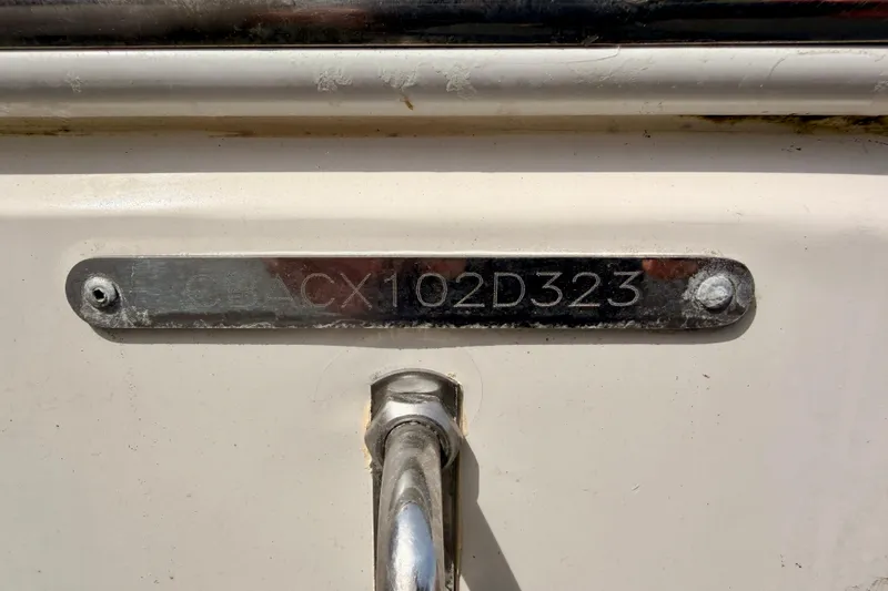 Slide: The Image of 2023 Cobia 220 Center Console boat identification plate with serial number. - 34