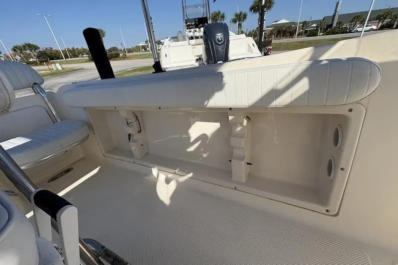 Slide: The Image of 2004 Key West 186 Sportsman boat interior with seating and storage compartment. - 14
