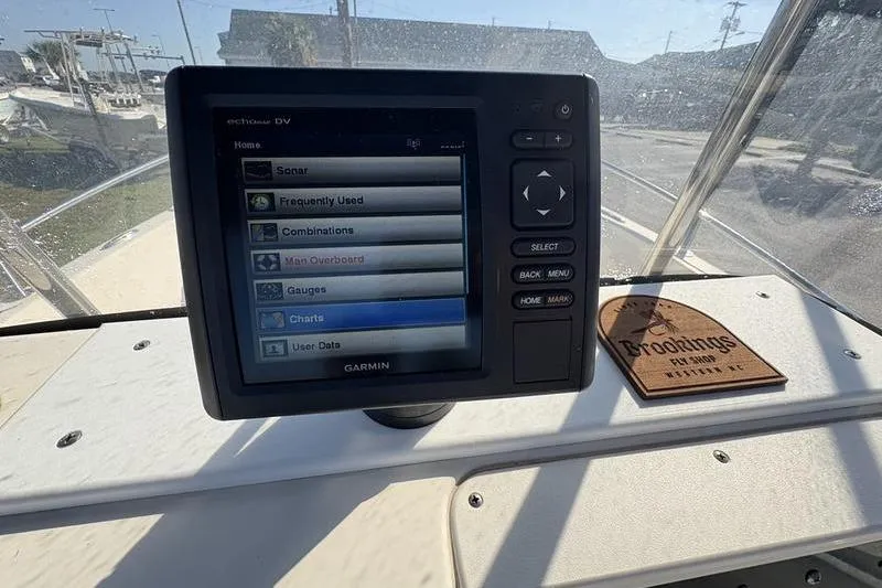 Slide: The Image of Garmin navigation system on 2004 Key West 186 Sportsman boat dashboard. - 18