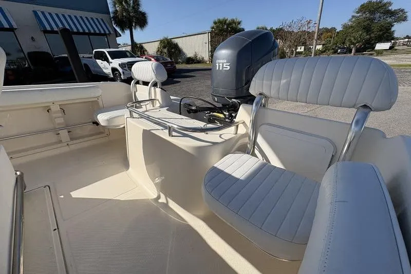 Slide: The Image of 2004 Key West 186 Sportsman boat interior with Yamaha 115 engine. - 9