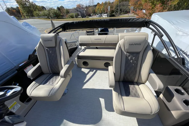 Slide: The Image of 2026 Harris Cruiser 250 boat interior with luxurious seating and modern design. - 12