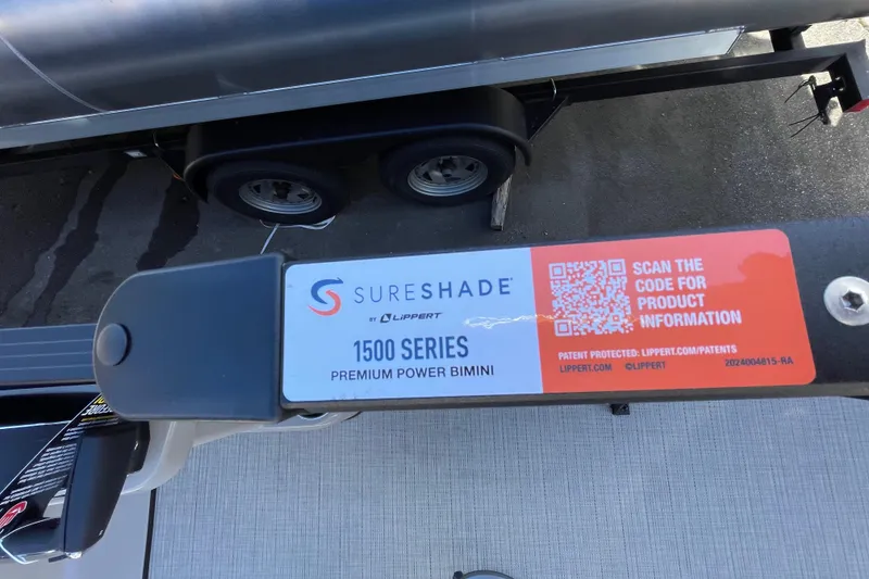 Slide: The Image of 2026 Harris Cruiser 250 with SureShade 1500 Series Premium Power Bimini. - 14