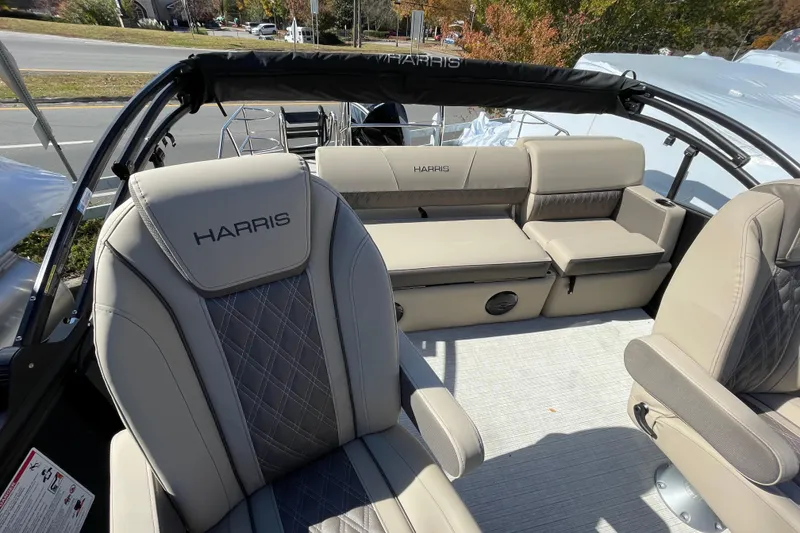 Slide: The Image of 2026 Harris Cruiser 250 boat interior with luxurious seating and modern design. - 25
