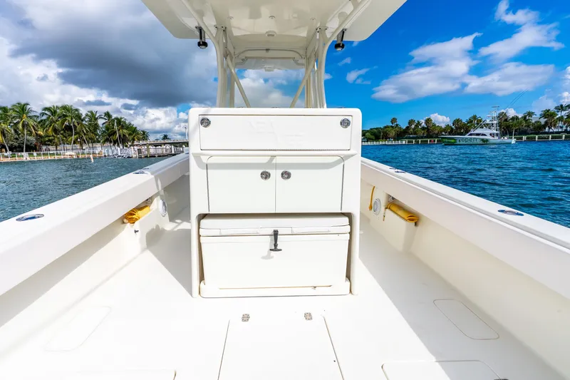 Slide: The Image of 2016 SeaVee 340Z boat interior with ocean view and palm trees. - 10
