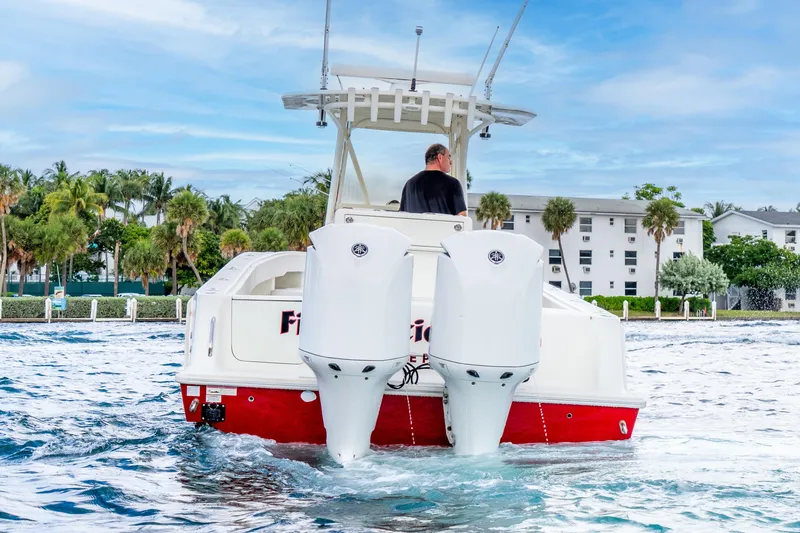 Slide: The Image of 2016 SeaVee 340Z boat with dual engines cruising on a sunny day. - 37
