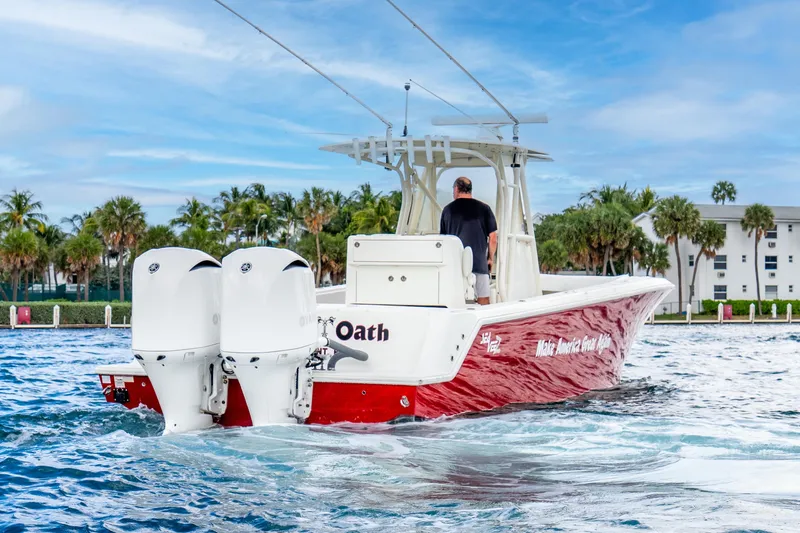 Slide: The Image of 2016 SeaVee 340Z boat with dual engines cruising on a sunny day. - 38