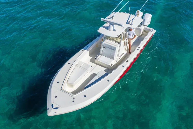 Slide: The Image of 2016 SeaVee 340Z boat on clear turquoise water, aerial view. - 48