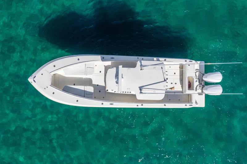 Slide: The Image of Aerial view of 2016 SeaVee 340Z boat on clear turquoise water. - 49