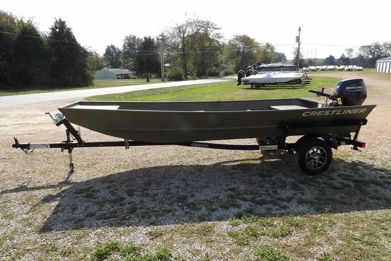 Slide: The Image of 2026 Crestliner 1648M CR Jon boat on trailer, parked outdoors. - 20