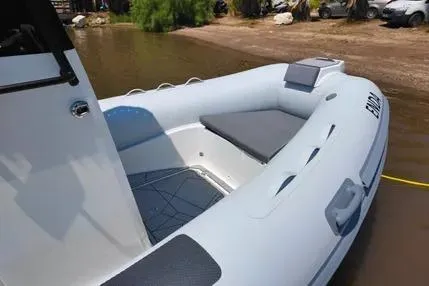 Slide: The Image of Northstar Vega 5.4 boat, 2026 model, parked by the shore. - 5