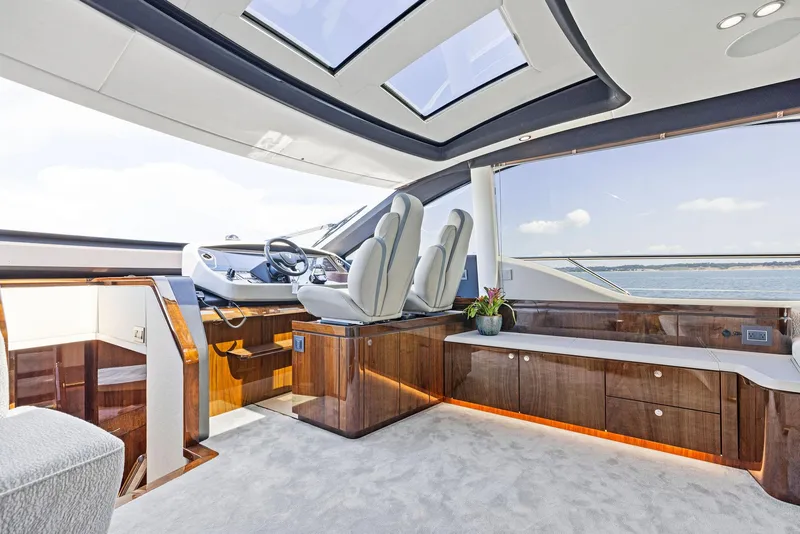 Slide: The Image of Twin beds in the luxurious 2024 Fairline Phantom 65 yacht cabin. - 20