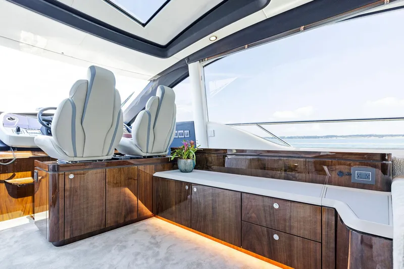 Slide: The Image of Luxurious bathroom in 2024 Fairline Phantom 65 yacht with modern fixtures and elegant design. - 21